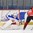 ZLIN, CZECH REPUBLIC - JANUARY 8: Canada's Daryl Watts #15 tries a backhand shot on Russia's Valeria Merkusheva #30 during preliminary round action at the 2017 IIHF Ice Hockey U18 Women's World Championship. (Photo by Andrea Cardin/HHOF-IIHF Images)